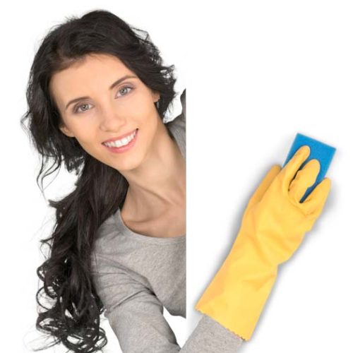 Woman Cleaning a Blank Wall with Gloves and Sponge
